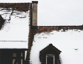 A Roadmap to Surviving Winter Roof Damage Repair