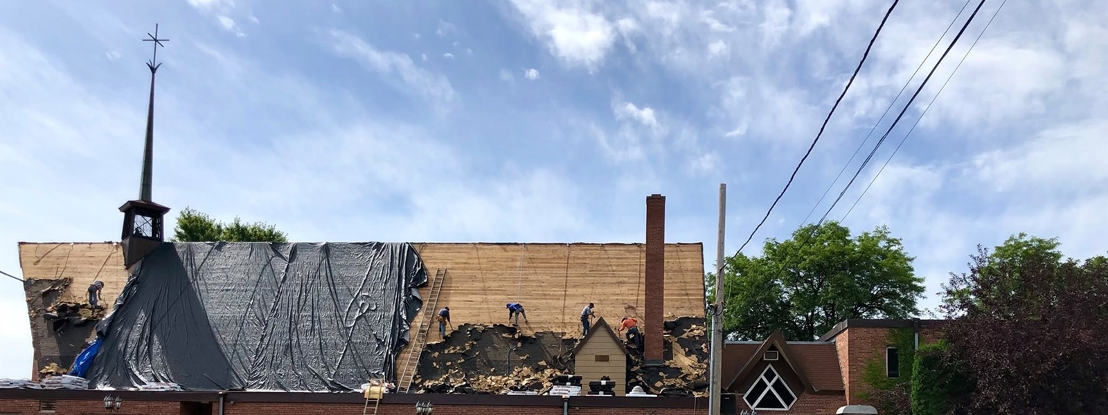 Wind-Damaged Minneapolis Church Roof and Steeple Restored