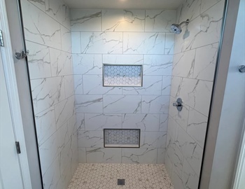 Leaking Acrylic Shower Replaced With Custom Tile in Minnetrista
