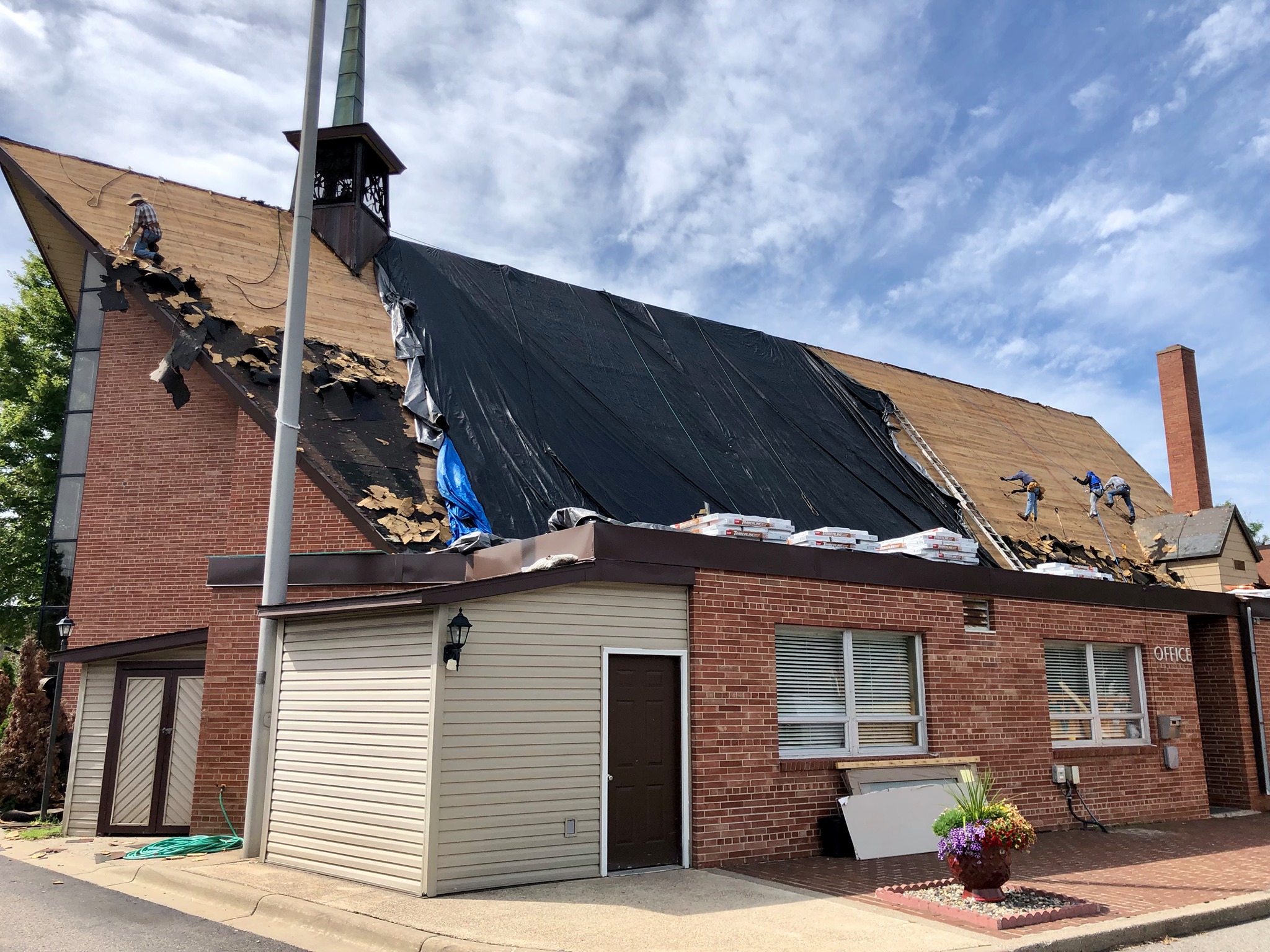 Wind-Damaged Minneapolis Church Roof and Steeple Restored