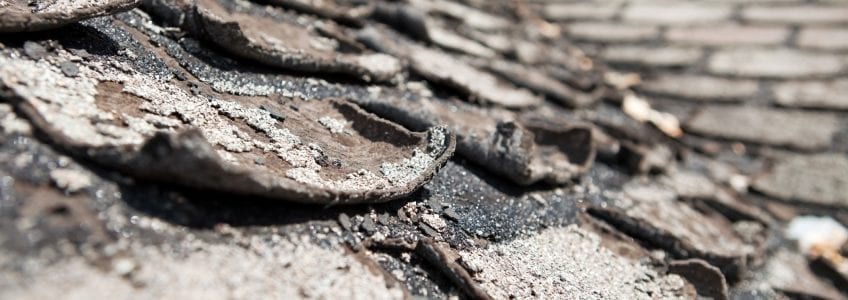 Old, Curling Shingles from Weather and Damage