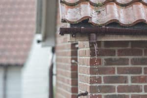 Wind Damage to Gutter damaged gutter